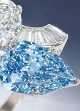 Diamond and Blue Diamond Crossover Ring made by Bulgari