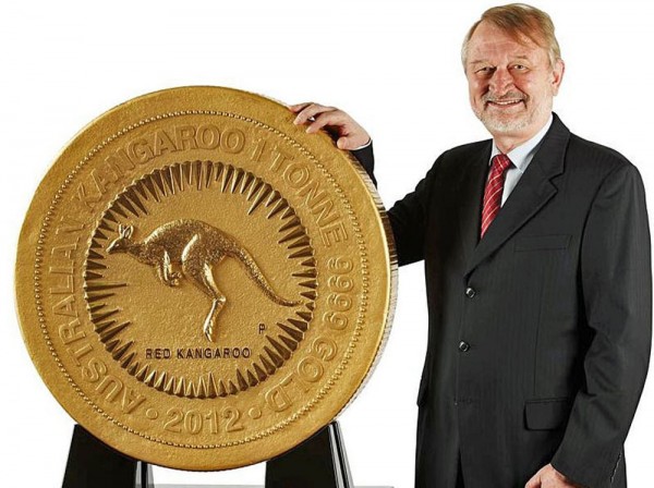 Perth Mint CEO Ed Harbuz stands next to the 1,012kg gold coin.