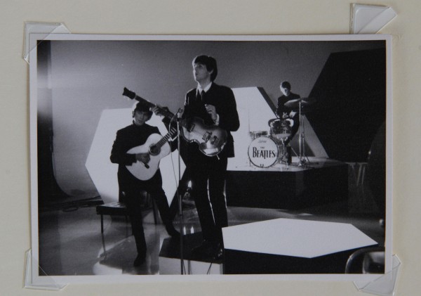 Never-before-seen black-and-white photographs taken of the Beatles during their early years are going on the auction block