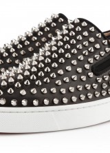Available in black leather and white, theres much to love about the Christian Louboutin Roller-Boat Flat Sneakers for Spring/Summer 2013