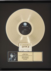 Gold record award and jacket from Page's solo Outrider album and tour