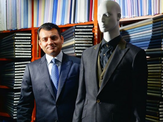 Arshad Mahmood shows off Apsley Tailors' HK$1 million suit