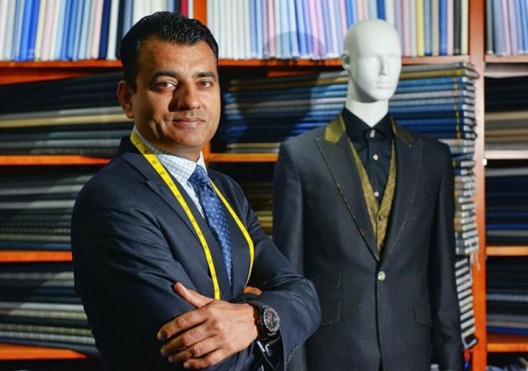 Arshad Mahmood shows off Apsley Tailors' HK$1 million suit