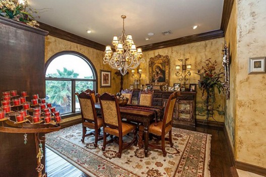For sale in Texas, a stately Mediterranean luxury home with Louis Vuitton branded bedroom