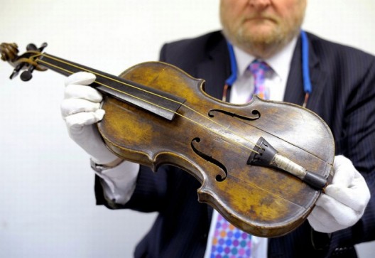 Violin played as Titanic sank sold at auction for $1.45 million