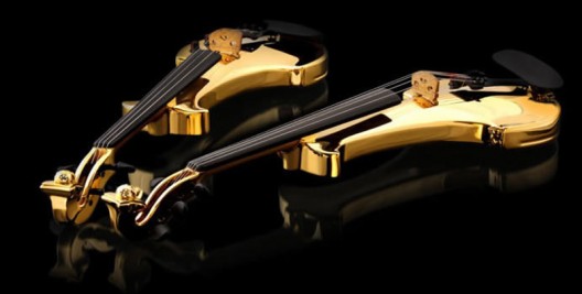 The worlds first gold-plated violins are studded with precious stones and cost $2 million