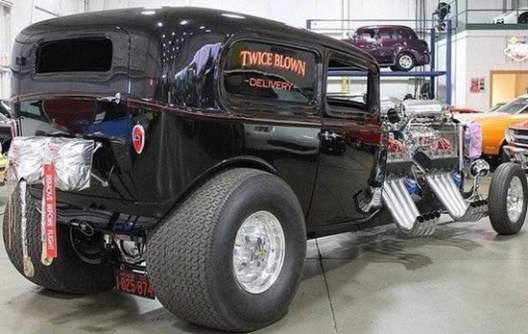 It is a hot rod, based on the model of the Ford Sedan from 1932