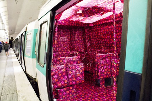In Paris, A Metro Train Covered In Gift Wrap Brings Festive Cheer To Commuters