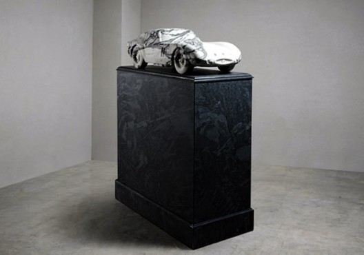 This replica of Ferrari 250 GTO carved out of marble is the perfect centerpiece for your mansion