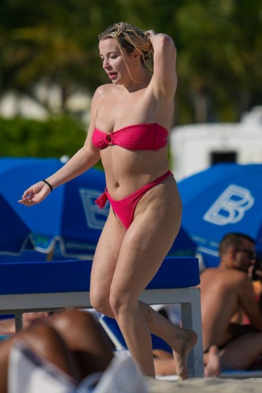 Tana Mongeau takes a swim in the ocean in Miami 12.1.23